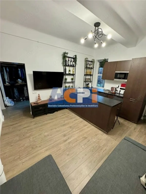 Apartament de  #206;nchiriat  #238;n Pia #539;a Roman #259; - Loca #539;ie Central #259; - imagine 9