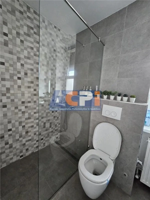 Apartament de  #206;nchiriat  #238;n Pia #539;a Roman #259; - Loca #539;ie Central #259; - imagine 11