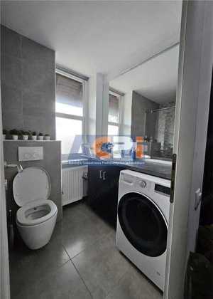 Apartament de  #206;nchiriat  #238;n Pia #539;a Roman #259; - Loca #539;ie Central #259; - imagine 12