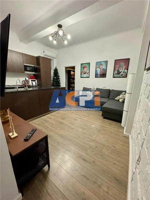 Apartament de  #206;nchiriat  #238;n Pia #539;a Roman #259; - Loca #539;ie Central #259;
