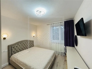 Ap cu 2 camere, mobilat modern, balcon inchis, Zona Rahovei - imagine 2