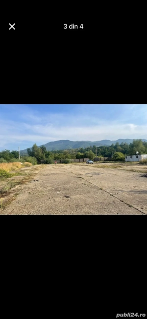 vând teren imprejmuit cu platformă betonată. 7300 mp