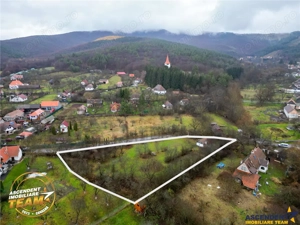 FILM! Casuta cu teren intravilan de 3.042mp, in pitoreasca aria din Bicfalau