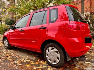 vand mazda 2 an 2003 