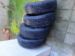 Vând set de anvelope de iarnă Tigar 185/65-15  echipate cu genți.