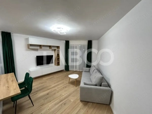 Apartament 3 camere 2 bai 2 balcoane si loc de parcare de inchiriat 