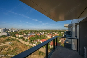 Apusul de la ultimul etaj din Cortina North | 3 camere | 76.7 mp - imagine 13