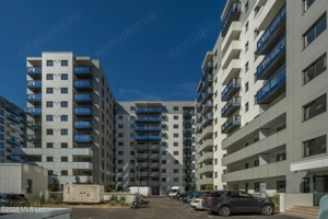 Apusul de la ultimul etaj din Cortina North | 3 camere | 76.7 mp - imagine 19