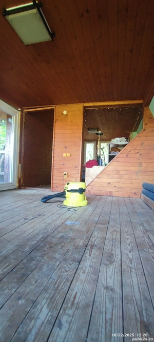 Teren intravilan 1180 mp + cabana de lemn de vanzare