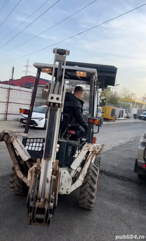 Bobcat B100 minibuldo  - imagine 5