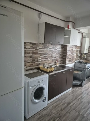 Inchiriez apartament central, bloc nou, regim hotelier - imagine 4