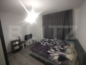 Casa pe 2 nivele cu 5 camere si 140 mp +teren 850 mp oras Beclean,zona Romfulda - imagine 6