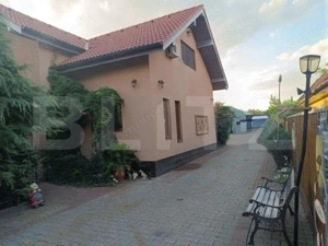 Casa individuala de vanzare Utvin 720mp teren hala de depozitare si 2 garaje - imagine 2