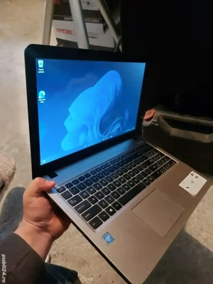 vând laptop asus 
