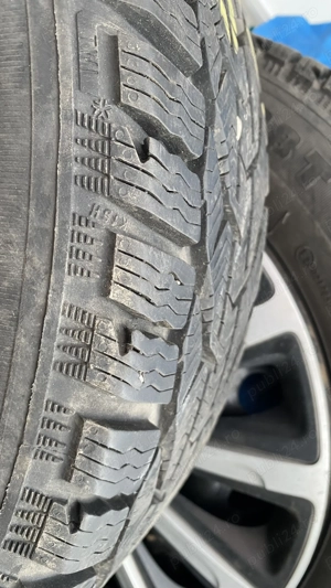Vând 4 jante de tablă cu cauciucuri de iarnă și capace, pt Logan