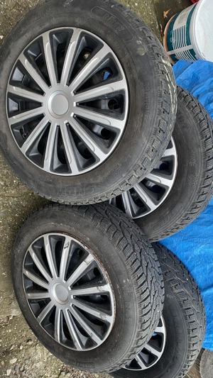 Vând 4 jante de tablă cu cauciucuri de iarnă și capace, pt Logan - imagine 3