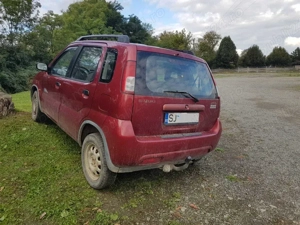 Suzuki Ignis 4x4 din 2003, 1.3 benzina - imagine 4