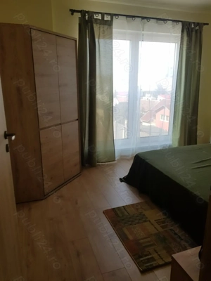 Apartament 2 camere decomandate , loc de parcare acoperit ,central