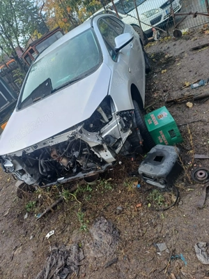 Dezmembrez opel astra j 2011 - imagine 2