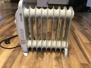 Vând calorifer mic pe ulei, 1000W