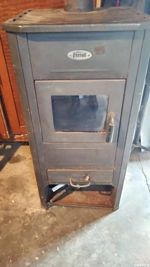 Vând centrala lemne  bricheti