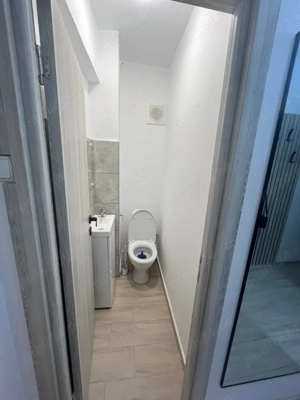 Inchiriez apartament cu  trei camere,central