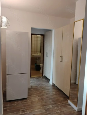 inchiriez apartament cu 2 camere decomandat etaj 1