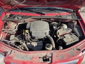 Dezmembrez Dacia Logan I 1.6 Mpi 64kW 87Cp K7M-F7 an 2007 - imagine 8