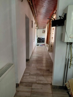 Va propunem o casa de vanzare - imagine 5