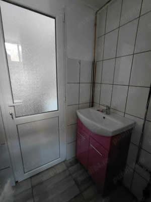 Va propunem o casa de vanzare - imagine 9