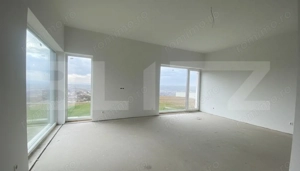 Casa pe calcan cu priveliste deschisa si compartimentare deosebita. - imagine 5