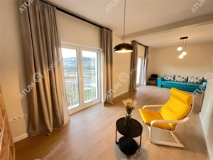 Casa individuala cu 5 camere si curte libera de 430 mp in Cisnadie - imagine 2