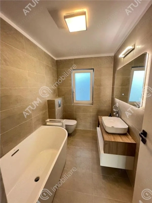 Casa individuala cu 5 camere si curte libera de 430 mp in Cisnadie - imagine 16