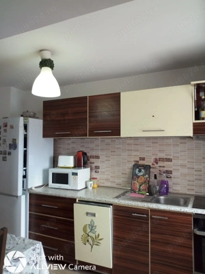 Închiriez apartament 3 camere - imagine 9