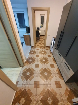 Închiriez  Garsoniera 