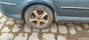 4 roti de ford,peugeot 205/55/16 - imagine 4