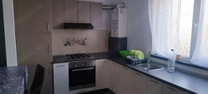 Închiriez ap. modern cu 2 cam, situat la parterul unei vile noi, pe strada Anton Pann din Sanpetru - imagine 4