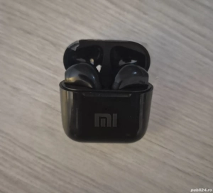 Vand casti wirelles Xiaomi.