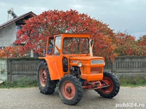 Vand tractorc 445 cu carte 