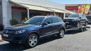 Ofer servicii de tractări auto și transport utilaje agricole