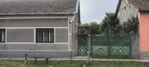 Casa la sat cu utilități 