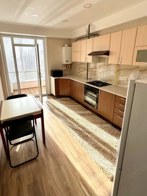 Garsoniera de inchiriat in zona Otopeni cu centrala proprie - imagine 2