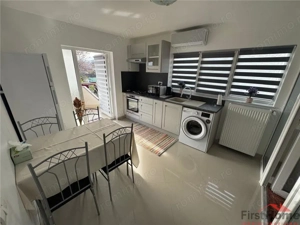 Garsoniera 45 mp (FACTURI INCLUSE), curte+ foisor, parcare