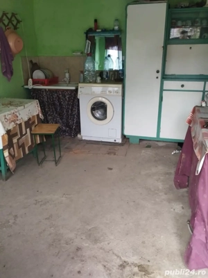 Teren intravilan cu 2 constructii