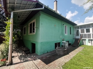 Vand casa cu 3 camere, garaj, livada si teren in M. Nirajului