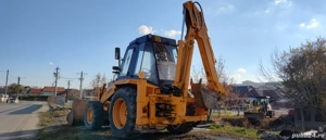 Vând buldoexcavator   {4x4}