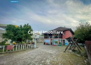 Casa 7 camere, teren 590 mp in Calnic