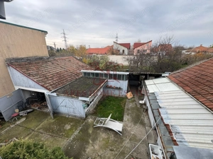 Investiție cu potențial: 2 apartamente + mansardă – Comison 0 - imagine 11