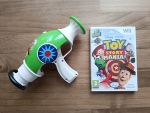Wii: Toy Story Mania! + Blaster Buzz Lightyear   Set complet   149 RON
