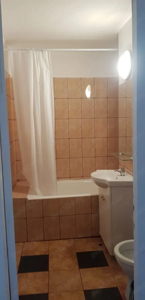 Ofer spre închiriere apartament cu 2 camere - imagine 4